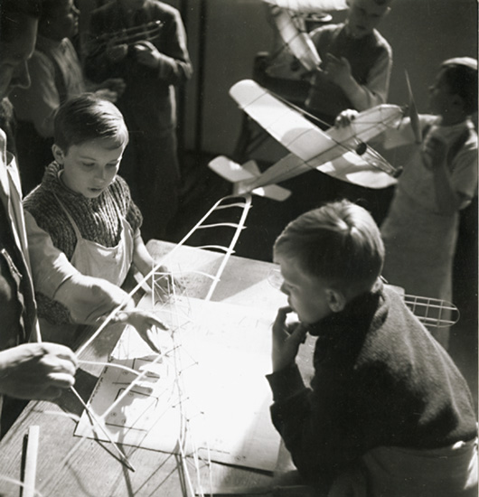 Jan Lukas - Children Building Miniature Airplanes