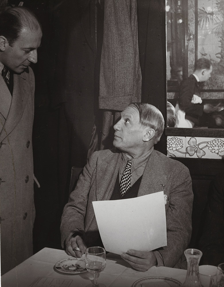 Brassai (Gyula Halasz) - Picasso at the Brasserie Lipp with Pierre Matisse Brassai (Gyula Halasz) - Picasso at the Brasserie Lipp with Pierre Matisse