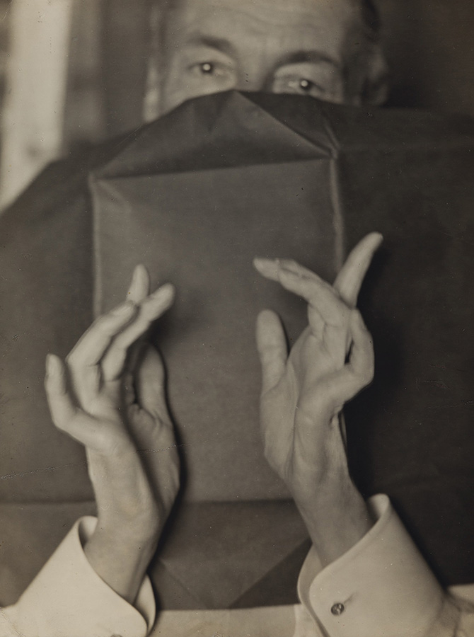 Man Ray - Portrait of a Half-Hidden Man With Expressive Hands (Russell H. Greeley) Man Ray - Portrait of a Half-Hidden Man With Expressive Hands (Russell H. Greeley)