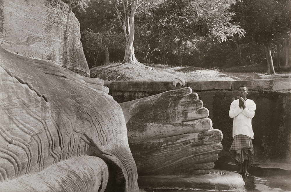 Henri Cartier-Bresson - Man Praying at the Foot of Buddha, Sri Lanka Henri Cartier-Bresson - Man Praying at the Foot of Buddha, Sri Lanka