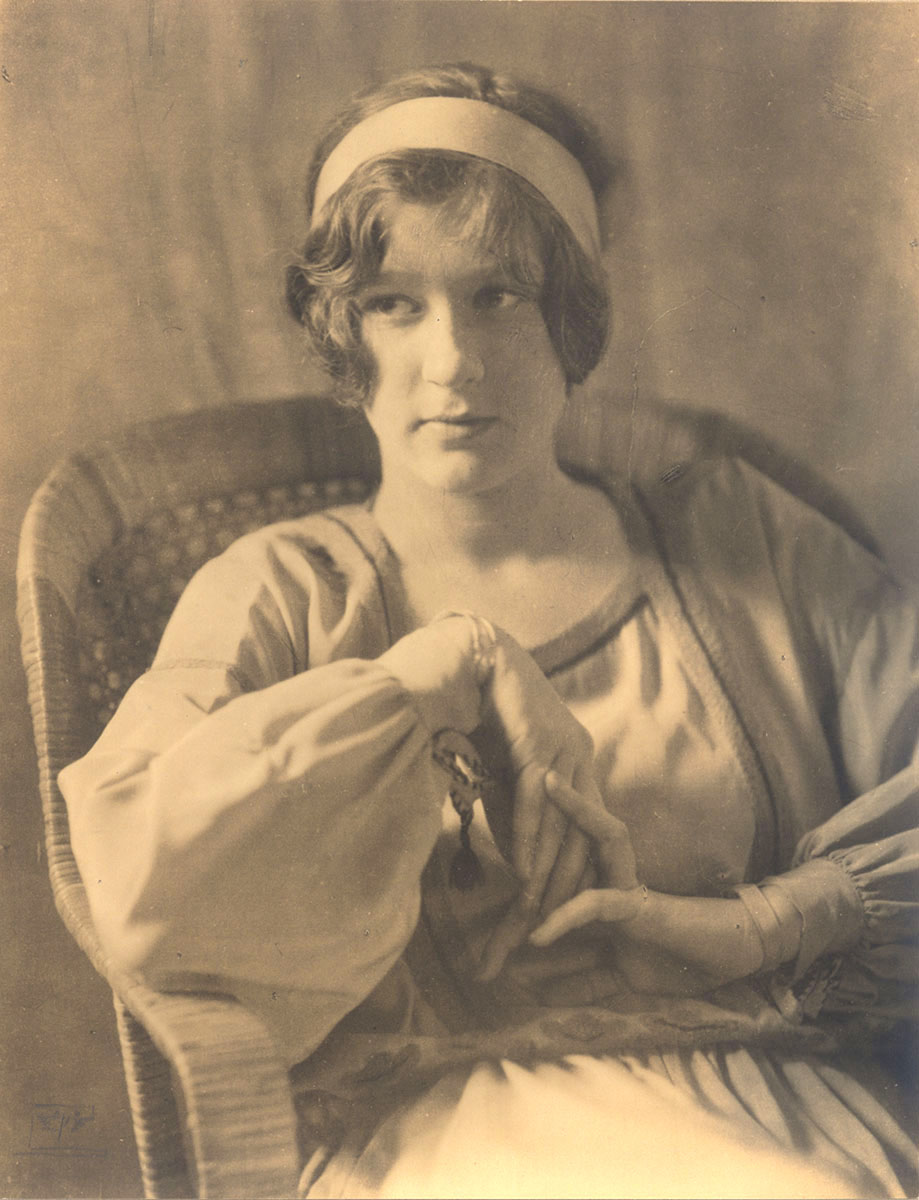 Eva Watson-Schütze - Untitled (Young Woman with Headband in Wicker Chair)
