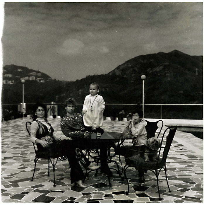 Anonymous - Family Portrait and Child on Table Anonymous - Family Portrait and Child on Table